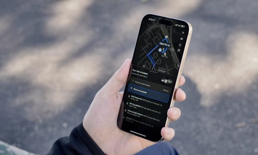 tesla robotaxi app on phone